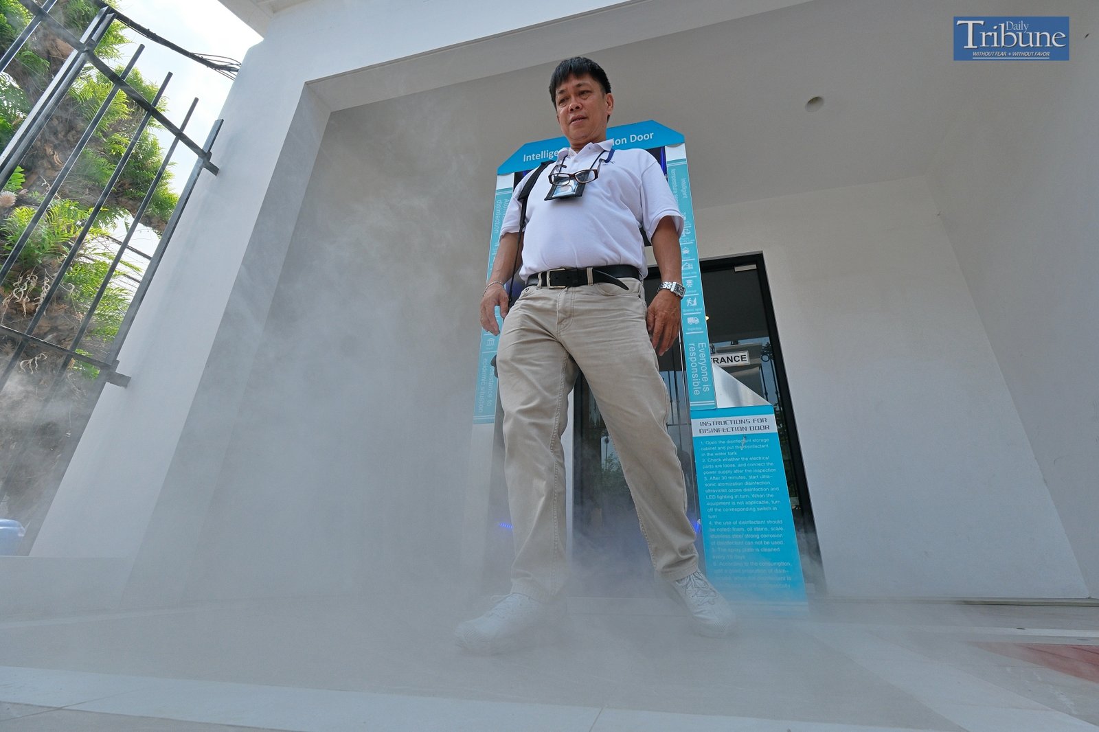 TRIBUNE-coviddisinfectiondoor